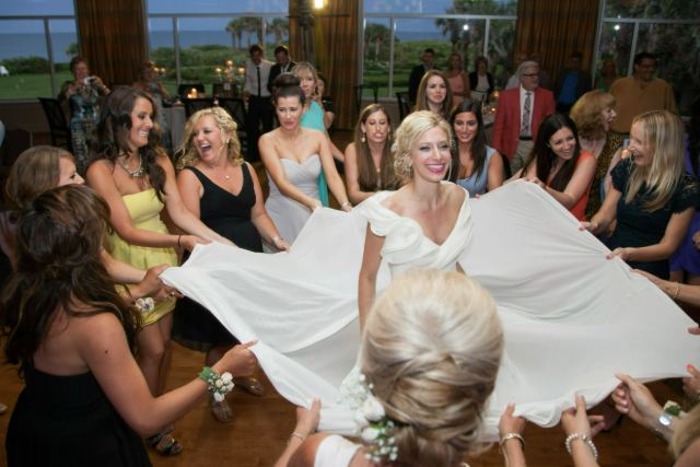 A group sharing a playful moment during a celebration
